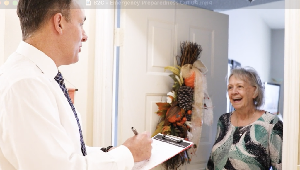 Smiling senior woman talking to adult man